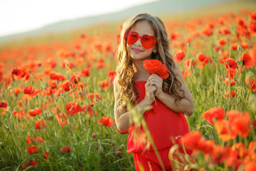 Children in a field with flowers 