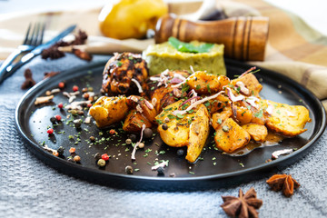 roasted sleeves chicken with potatoes and barbecue sauce