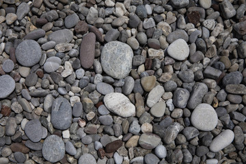 Галька. Пляжные камни, россыпь, маленькие и большие камушки.