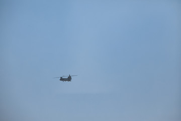helicopter high in the sky