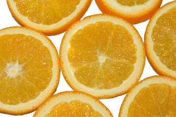 the fruits of juicy and fresh orange are cut into round rings. Top view. Isolated on white background