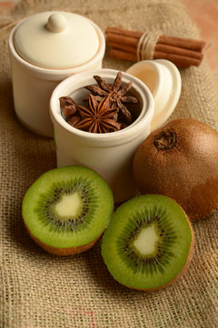 ripe kiwi cut in two - emerald green - closeup