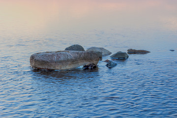 Obraz premium Stones on the lake