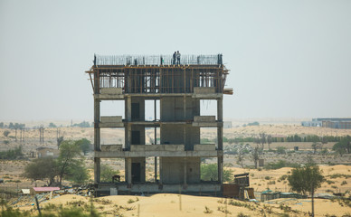 building under construction in the desert