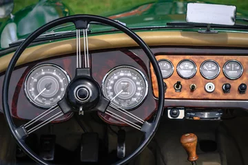 Fotobehang Snelle auto Close-up, detailed photo of the interior of a classic oldtimer luxury sports car