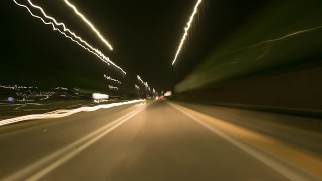Night Speed Drive
This video features a non-stop point of view shot of a beautiful city street at night. It was taken from a fast moving vehicle. 