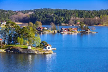 Foto op Canvas Zweeds landschap met kustdorpen © evannovostro