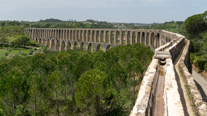 Aqueduct of Tomar near the templar castle. Tomar, Portugal - obrazy, fototapety, plakaty