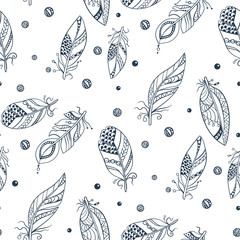 Seamless tribal pattern with feathers in vector graphic illustration in blue colors