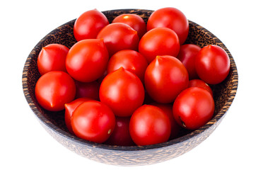 Cherry red tomatoes in wooden bowl