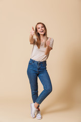 Full length portrait of a happy casual girl
