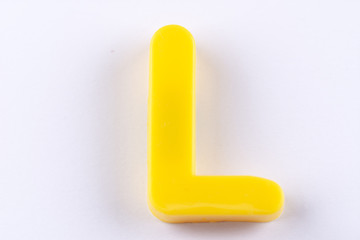 letter L uppercase alphabet isolated made of plastic on white background with shadows