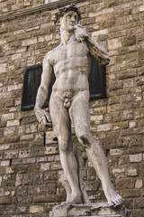 Reproduction of Michelangelo statue David in front of Palazzo Vecchio in Florence