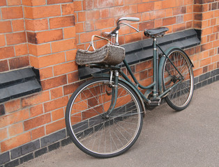 Fototapeta na wymiar An Old and Rusty Vintage Ladies Pedal Bicycle.