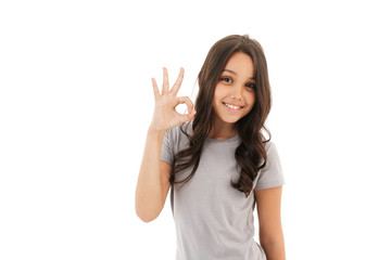 Pretty cute girl showing okay gesture.