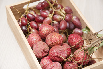 Lychee on wooden floor