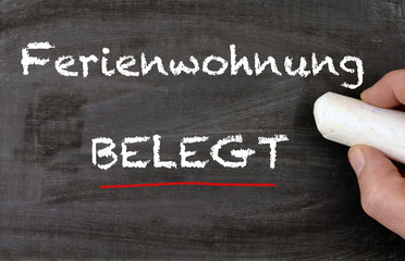 Ferienwohnung belegt Tafel