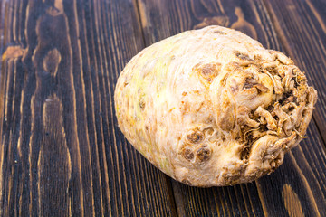 Celery root on wooden background
