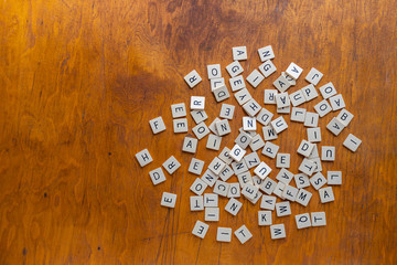 pile of letter tiles on desk