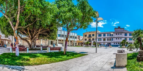 Foto op Canvas Square in the city of Porto Torres, Sardinia, in a sunny day of spring © replica73