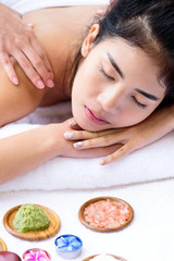 Obraz na płótnie Canvas Portrait of beautiful asian people with close up view and close up eyes and having hand massage in spa salon. Beauty, healthy, spa and relaxation concept.