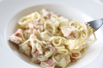 Spaghetti carbonara white sauce with bacon and cheese