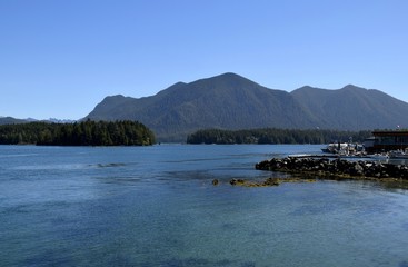 View across the bay towards islands and Mountains,, seen from Tofino, Vancouver Island British Columbia Canada