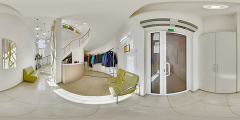 Panorama of the wardrobe in the clinic where people take off their outer clothing and hang it on...