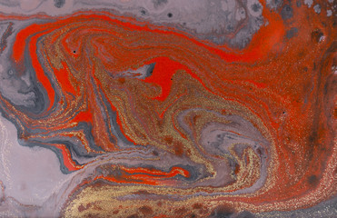 Marble abstract acrylic background. Red marbling artwork texture. Agate ripple pattern. Gold powder.