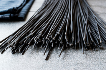 Raw Black Spaghetti Pasta Flavored with Squid ink or Cuttlefish.