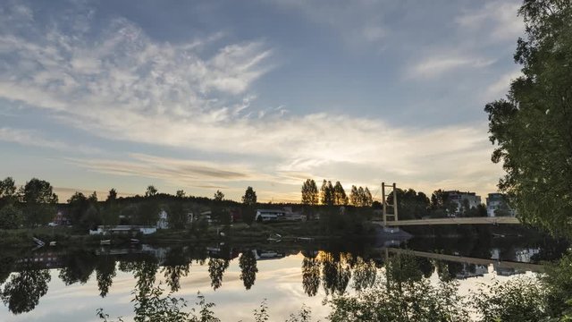 Timelapse at sunrise over a tree bridge in north Sweden, maj 2018 - FAST VERION