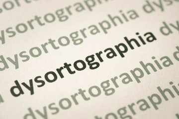 Fototapeta premium word dysortographia printed on paper macro