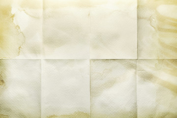 Empty sheet folded in eight, old paper with stained edges