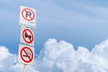 Traffic Signs: All three signs. On the sky background is a beautiful cloud.
