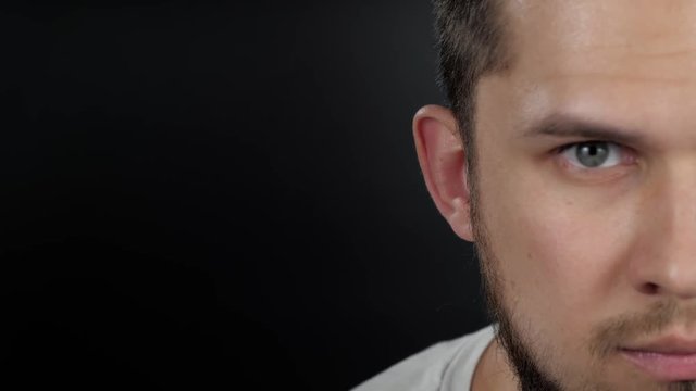 Football player sportsman head shot portrait with angry face, soccer man handsome isolated close up