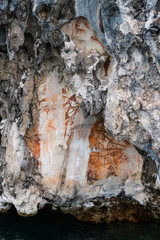 Prehistoric petroglyph rock paintings in Misool, Raja Ampat, West Papua, Indonesia bys, 3,000 to...