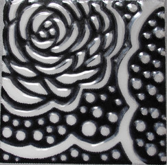 Detail of the traditional tiles from facade of old house. Decorative tiles.Valencian traditional tiles. Floral ornament.
