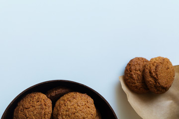 biscuits, oatmeal, brown, homemade, in a coconut cup, vase, paper, gingery, kitchen, sweetness, dessert, for tea, white background, four, five, food
