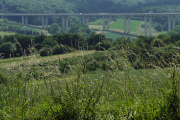 Fototapeta na wymiar Autobahn - Autobahnbrücke - Landschaft - Stockfoto