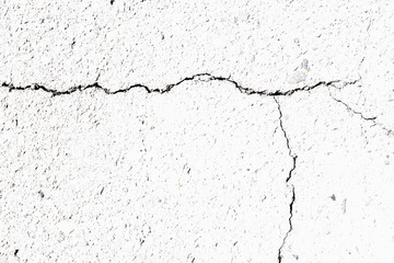 crack on white granular surface