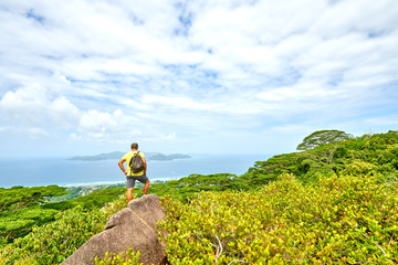 a adventure hiker who climbed the mountain 