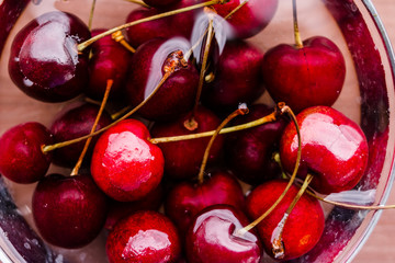 Heap of juicy wet red cherries. raw fresh organic berries. Cherries close up. Diet healthy lifestyle. Bio products.