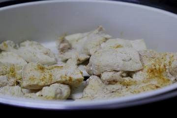 Steamed chicken fillets in a slow cooker