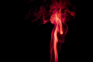 Obraz premium Red smoke on black background