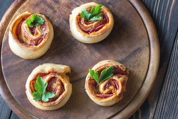 Pizza rolls on the wooden board