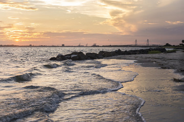 Fototapeta premium Sunset view of Ravenel Bridge from Sullivan's Island in South Carolina