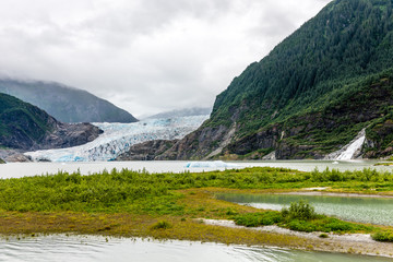 Fototapeta na wymiar Alaska's Mendenhall Glacier and Waterfall