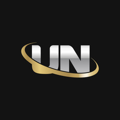 Initial letter UN, overlapping swoosh ring logo, silver gold color on black background