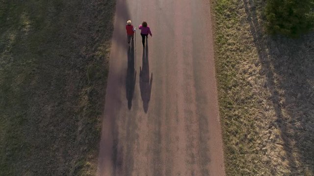 17998_Two_old_ladies_walking_fast_on_the_road_in_Estonia.mp4