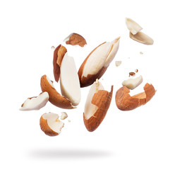 Almonds crushed into pieces close-up on white background